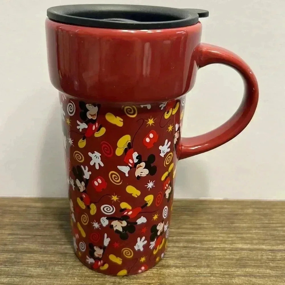 The Disney store Mickey Mouse Travel ceramic Tumbler Mug 12oz with lid & handle